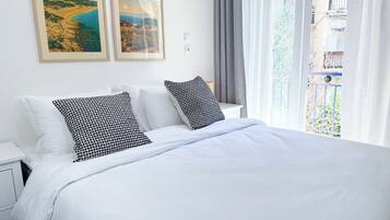 2 habitaciones, tabla de planchar con plancha, wifi y ropa de cama