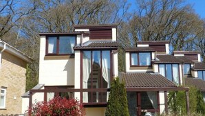 A row of modern, two-story houses with large windows and a uniform architectural style. - Villa 23 (Ryde)