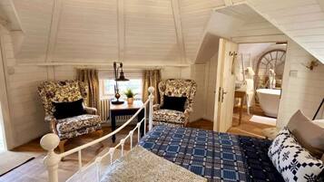 1 habitación, tabla de planchar con plancha y cuna de viaje