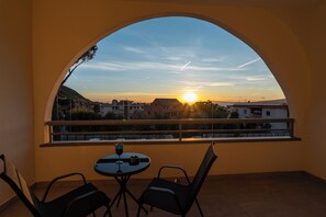 Deluxe suite, uitzicht op zee | Balkon