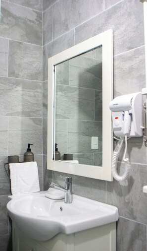 Hair dryer, towels, soap, toilet paper