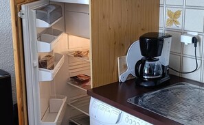 Kjøleskap, mikrobølgeovn, ovn og oppvaskmaskin