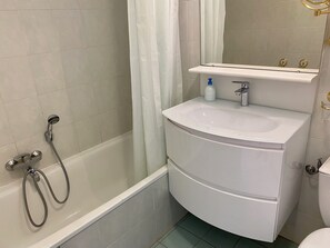 Hair dryer, towels, soap, toilet paper