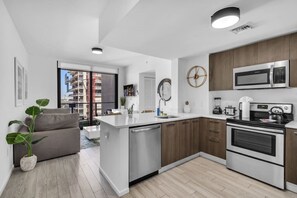 Fridge, microwave, oven, stovetop - Bayview 2BR Retreat | Stunning Views + Pool (Miami)