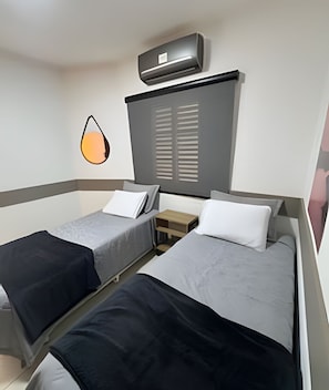 Comfort Shared Dormitory | Laptop workspace, iron/ironing board, free WiFi