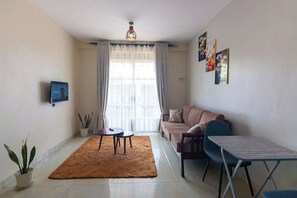 Smart TV - Maryz Secret Haven, cozy one bedroom Air BnB Condo (Kampala)