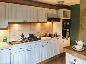 Horno, placa de cocina, utensilios de cocina