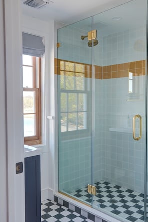 Shower, hair dryer, towels, soap
