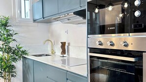 Leilighet – deluxe, bakgårdsutsikt | Eget kjøkken | Espressomaskin, vannkoker, brødrister og fryser