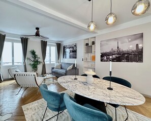 Deluxe Apartment, Courtyard View | Living area | 80-cm Smart TV with digital channels