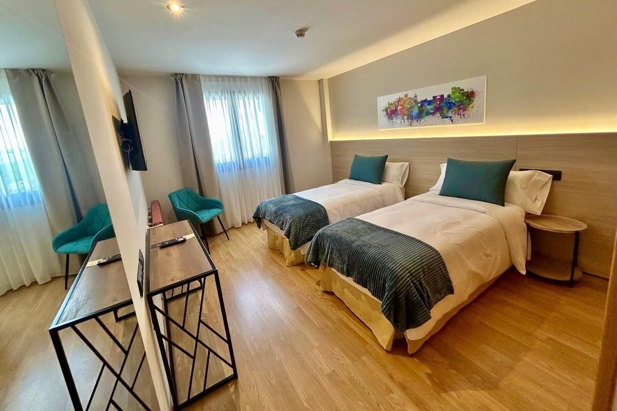 Twin Room, Park View | Desk, laptop workspace, free WiFi