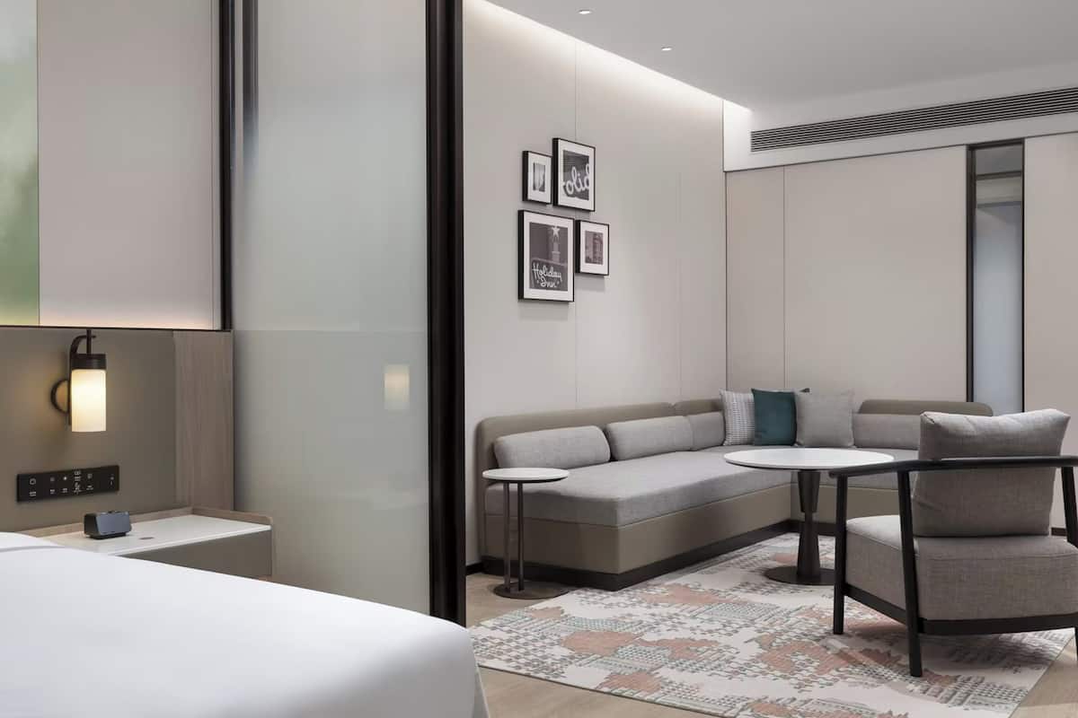 1 King Suite | Bathroom | Shower, free toiletries, hair dryer, bathrobes