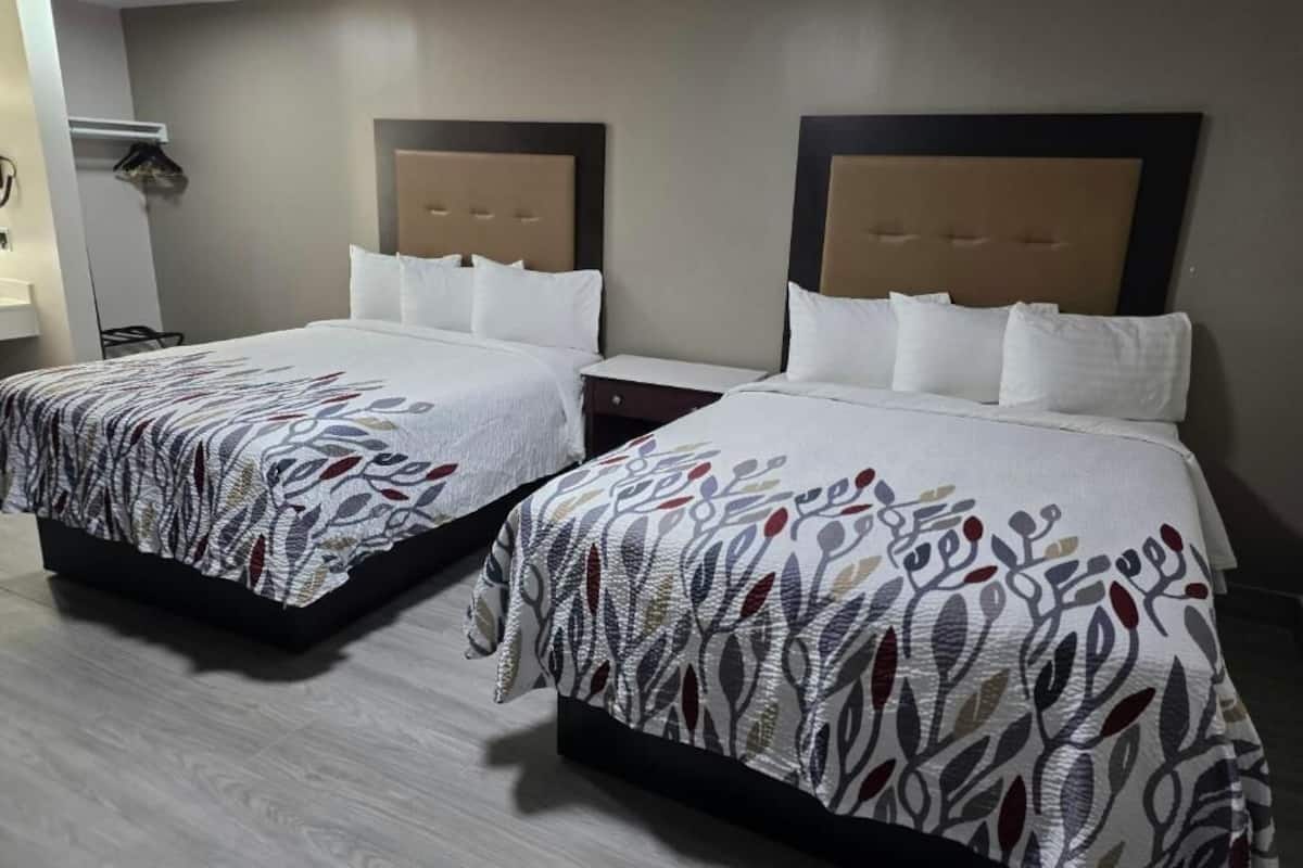 Desk, laptop workspace, free WiFi, bed sheets