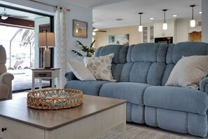 Smart TV, fireplace, foosball, books