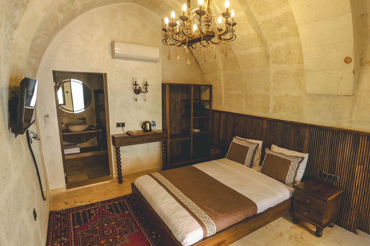 Quarto superior | Roupas de cama premium, frigobar, individualmente decorados