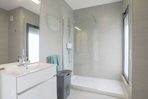 Shower, eco-friendly toiletries, hair dryer, bidet