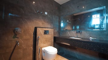 Executive Double Room, 1 King Bed, City View | Bathroom | Shower, designer toiletries, hair dryer, slippers