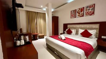 Deluxe Double Room, City View | Living room | 42-inch LCD TV with satellite channels, computer monitors, printers