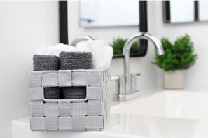 Hair dryer, towels, soap, toilet paper