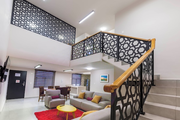 Grand Loft | Living area | Flat-screen TV