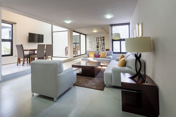 Deluxe Loft | Living area | Flat-screen TV