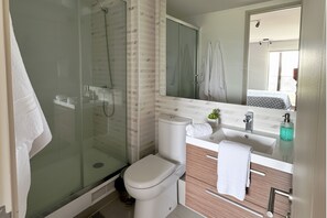 Hair dryer, towels, soap, toilet paper