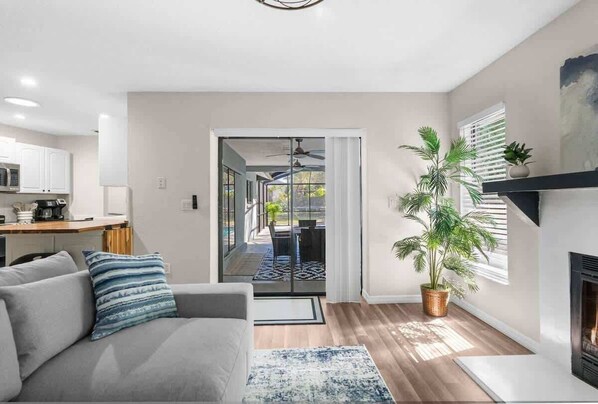 House, Multiple Beds, Pool Access, Pool View (13501 Whitby Rd) | Living area | Fireplace