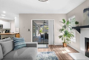 House, Multiple Beds, Pool Access, Pool View (13501 Whitby Rd) | Living area | Fireplace