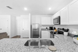 House, Multiple Beds, Kitchen, Garden View (13097 Scottville St) | Private kitchen | Coffee/tea maker