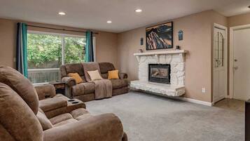 TV, fireplace, books, offices