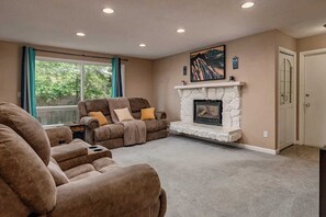 TV, fireplace, books, offices