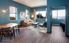 Suite, 1 cama de matrimonio con sofá cama, vistas al lago | Zona de estar