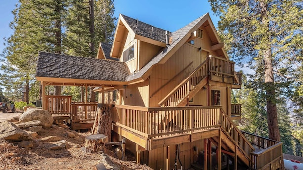 A multi-story wooden cabin with a balcony, a staircase, and a deck area. - Yosemite Aviary and Quail Within Yosemite - 2 Separate Units, Up To 14 Guests! (Yosemite National Park)