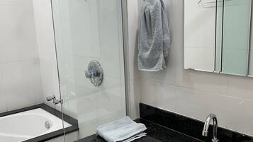 Jetted bath, towels, soap, toilet paper