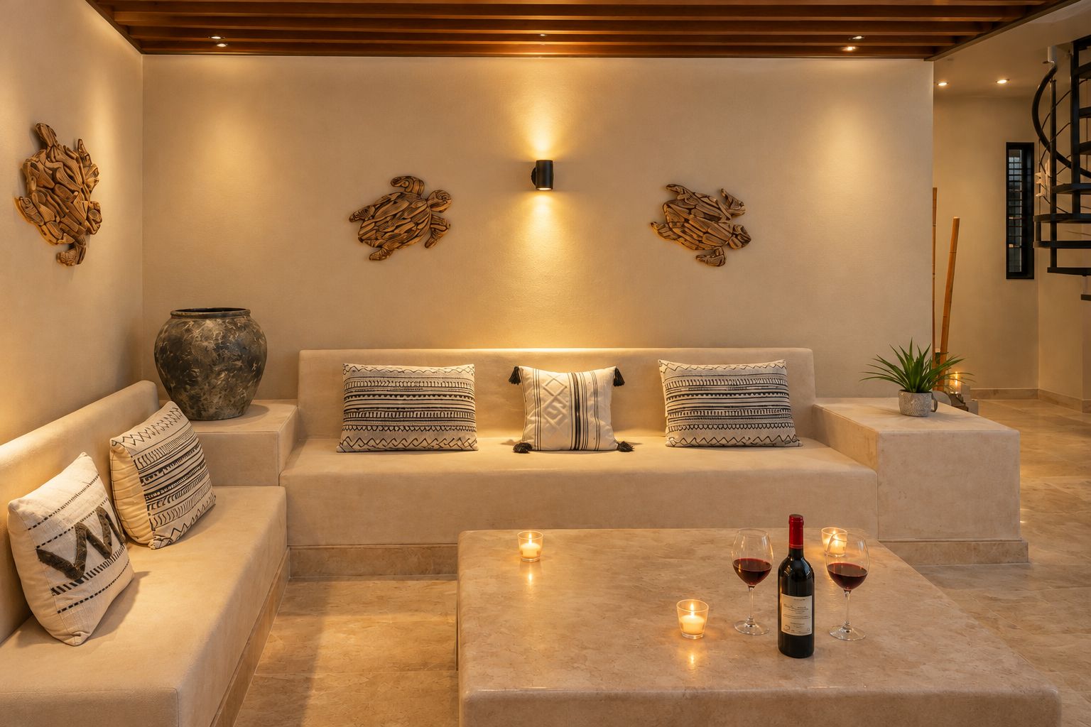 A modern living room with a sofa set, decorative wall art, a vase, and a wine bottle on a table.