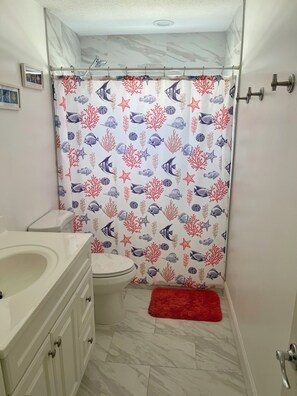 Hair dryer, towels, soap, toilet paper