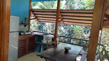 Cabana econômica, vista para o jardim | Opções para refeição