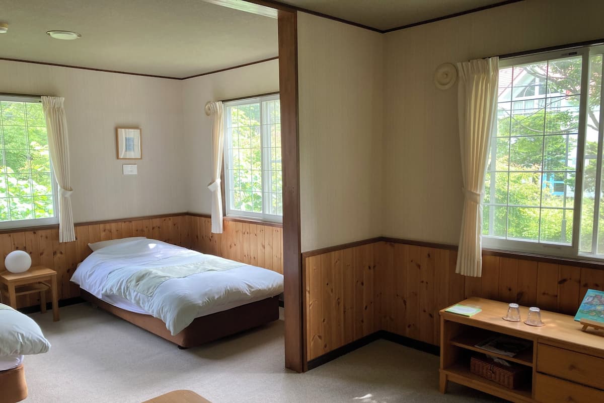Deluxe Twin kamer, uitzicht op tuin | Donzen dekbedden, gratis wifi, beddengoed