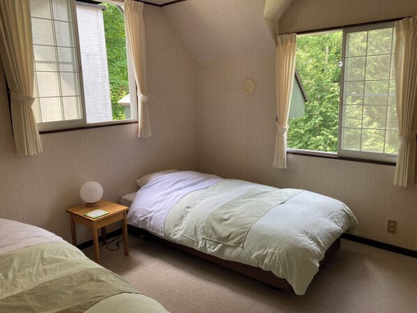 Chambre avec lits jumeaux, vue jardin