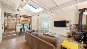 House, Multiple Beds, Patio (Cottage at the Point) | Living area | TV, fireplace