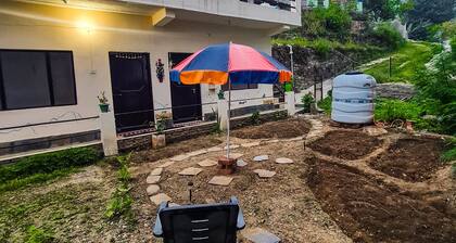 Welcome to the bagpackers hostel in the lap of himalayas at Rawscape in kausani