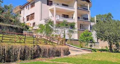Luxury Kingsuite Room with Balcony in Karen Nairobi + Halfboard