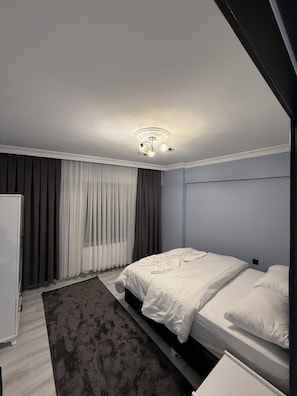 Family Suite | Premium bedding, minibar, desk, blackout drapes
