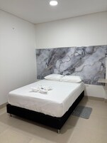 Ropa de cama de alta calidad y minibar