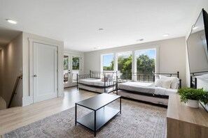 4 bedrooms, desk, iron/ironing board, travel crib