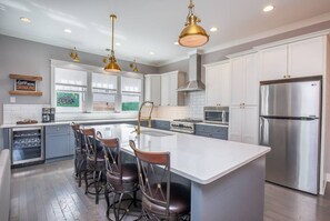 Fridge, coffee/tea maker, cookware/dishes/utensils