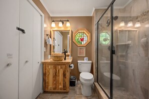 Shower, towels, soap, toilet paper