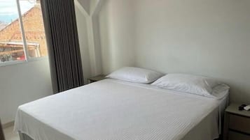 Suite Deluxe, vista a la ciudad | Wifi gratis