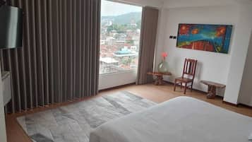 Suite Deluxe, vista a la ciudad | Wifi gratis