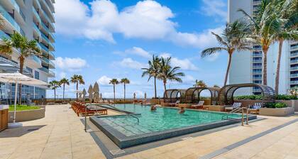 Dog friendly, beach front condo with pool, hot tub & fully equipped fitness room
